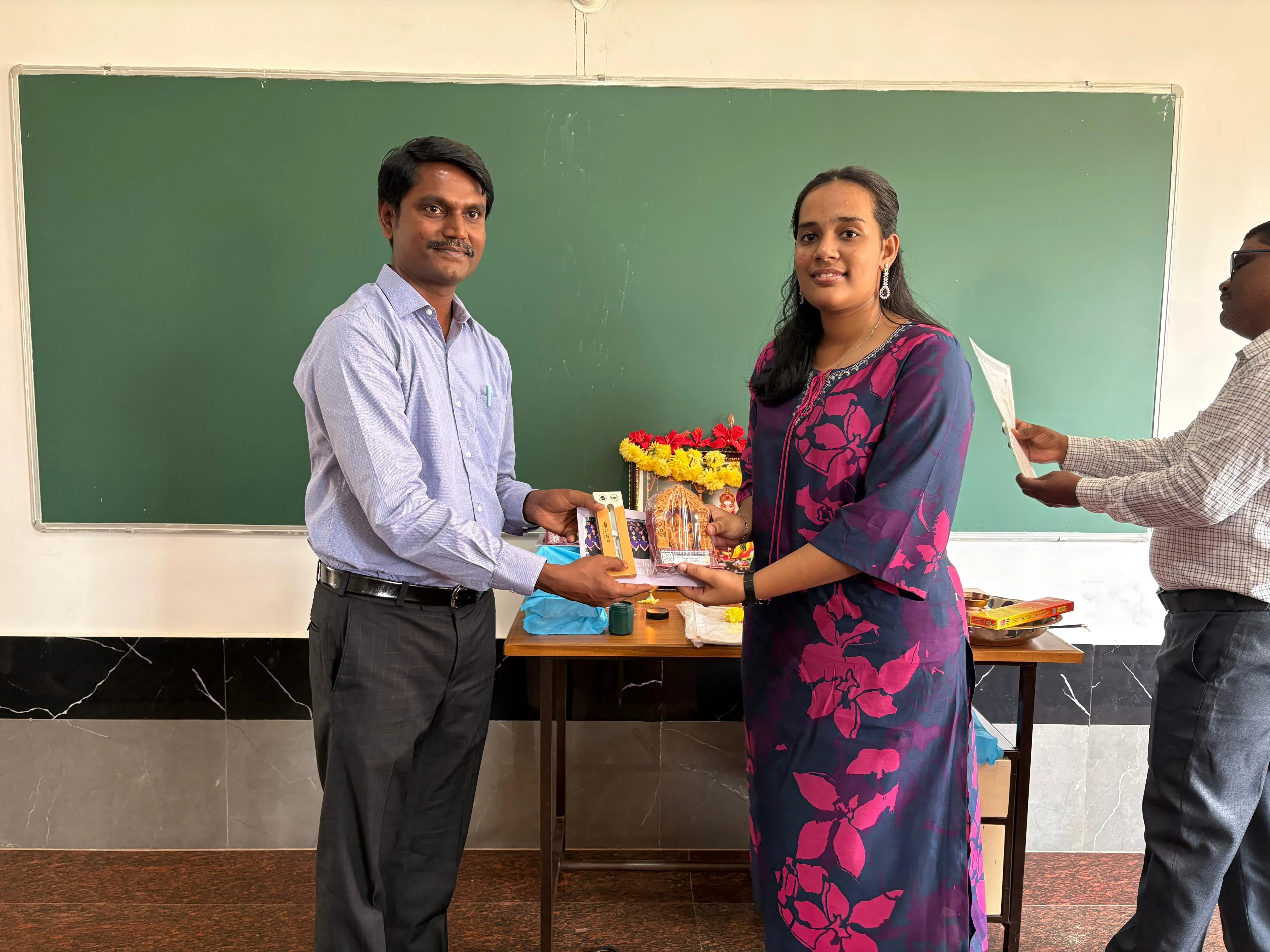 Student receiving a certificate at IMSC